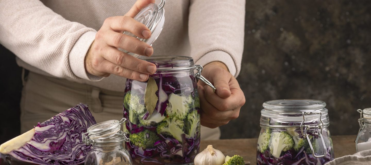 close-up-hands-holding-jar